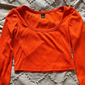 Orange cropped long sleeve